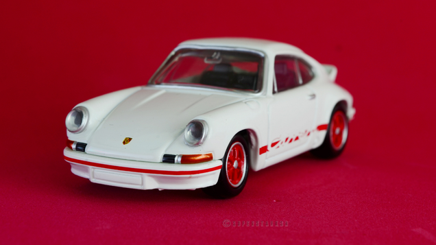 Illustration for article titled Rennsport Reunion: 1/61 Tomica Premium 911 Carrera RS 2.7